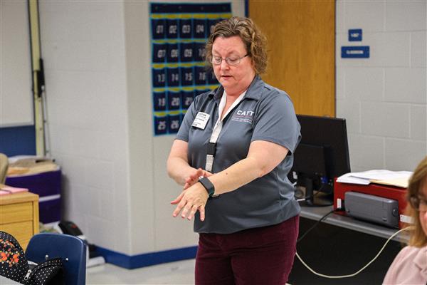 Trainer Susie Thomas showcasing the SUNU band to TVI's